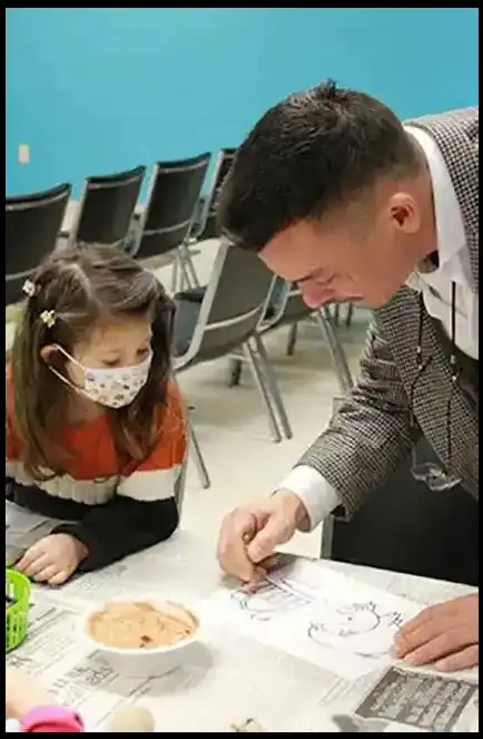 Book Author and Veteran David Haave Showing Kids how to make their own Book Page Waynesville MO Public Library -- David Haave